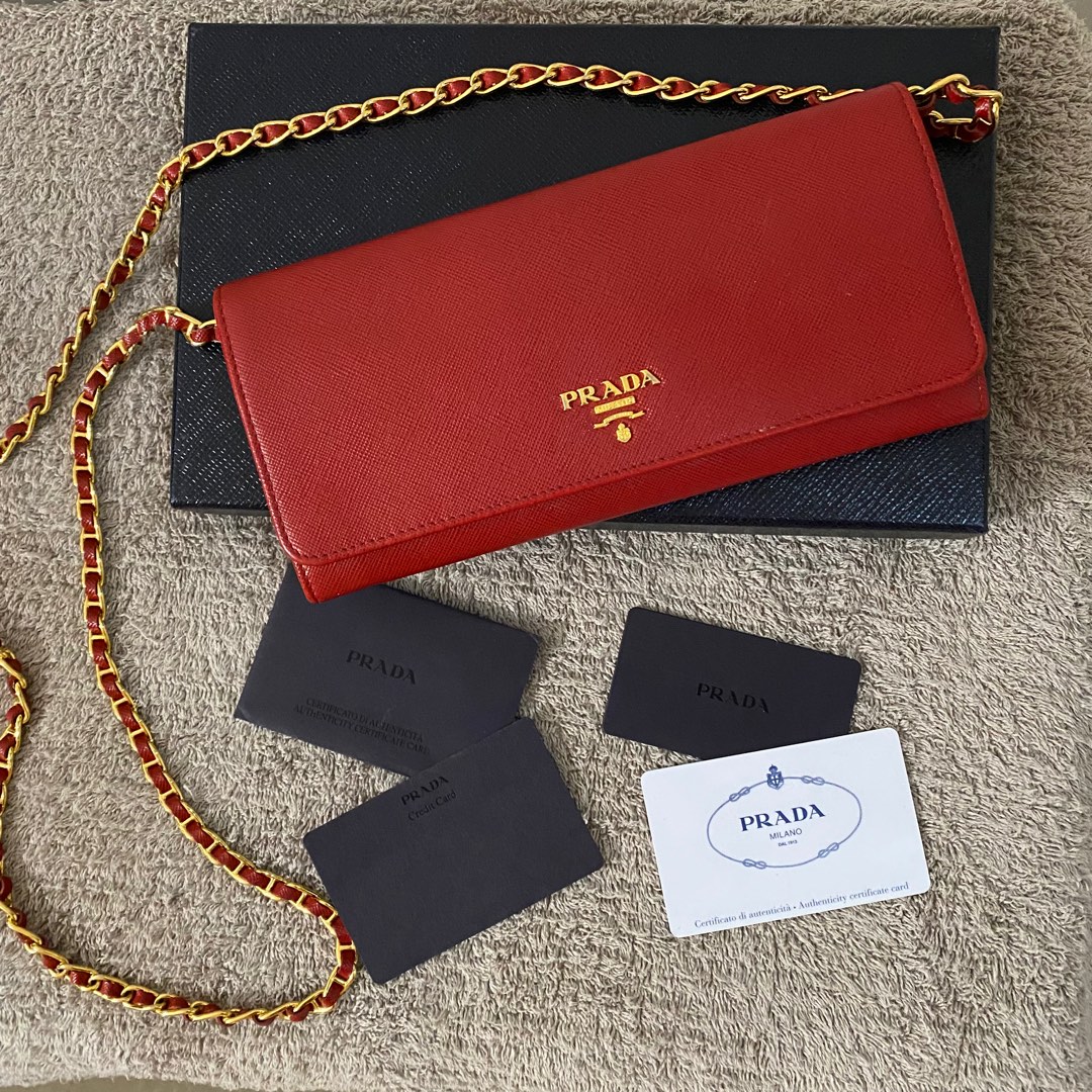 Prada saffiano leather wallet with shoulder strap