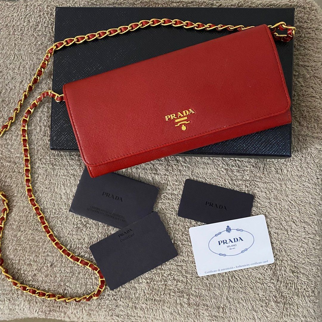 Prada WOC wallet In saffiano leather pink, Luxury, Bags & Wallets