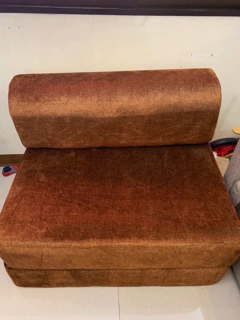 Single Size Foldable Sofa Bed with Plain Brown Fabric Cover (Category: Bed Frames & Mattresses) located in Manila. Submitted by jemcantos26 (Listing ID 1216937538, Image 1). Description: .