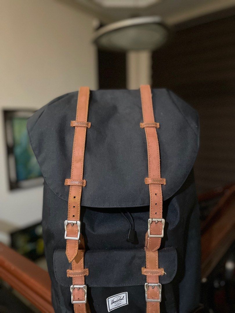Used herschel backpack 2025