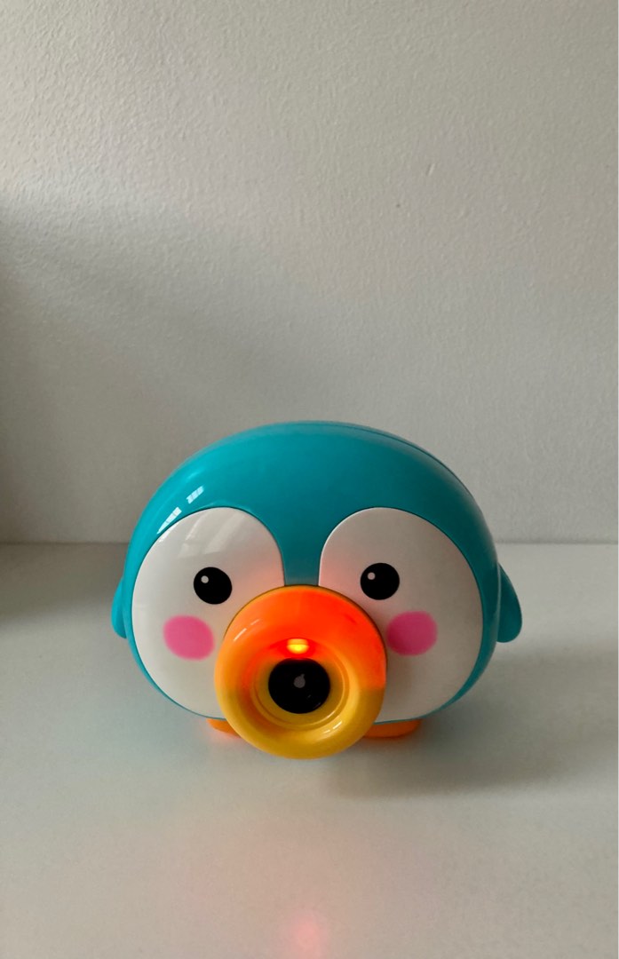 Miniso Peguin Camera Bubble Machine on Carousell