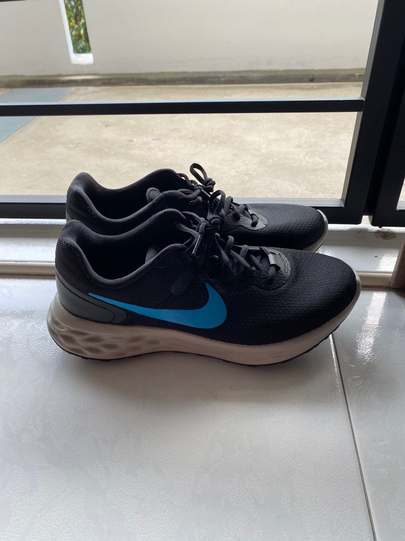 Blue and black nike revolution mens store