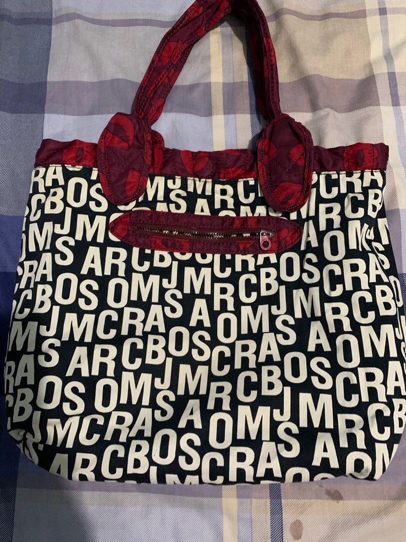 SALE! Marc Jacobs Nylon Bag (Category: Shoulder Bags) located in Quezon City. Submitted by meamelia (Listing ID 1217218362, Image 1). Description: Authentic Marc Jacobs Nylon Tote Size: Medium Reversible Color: red maroon pls refer to photos RFS: decluttering.
