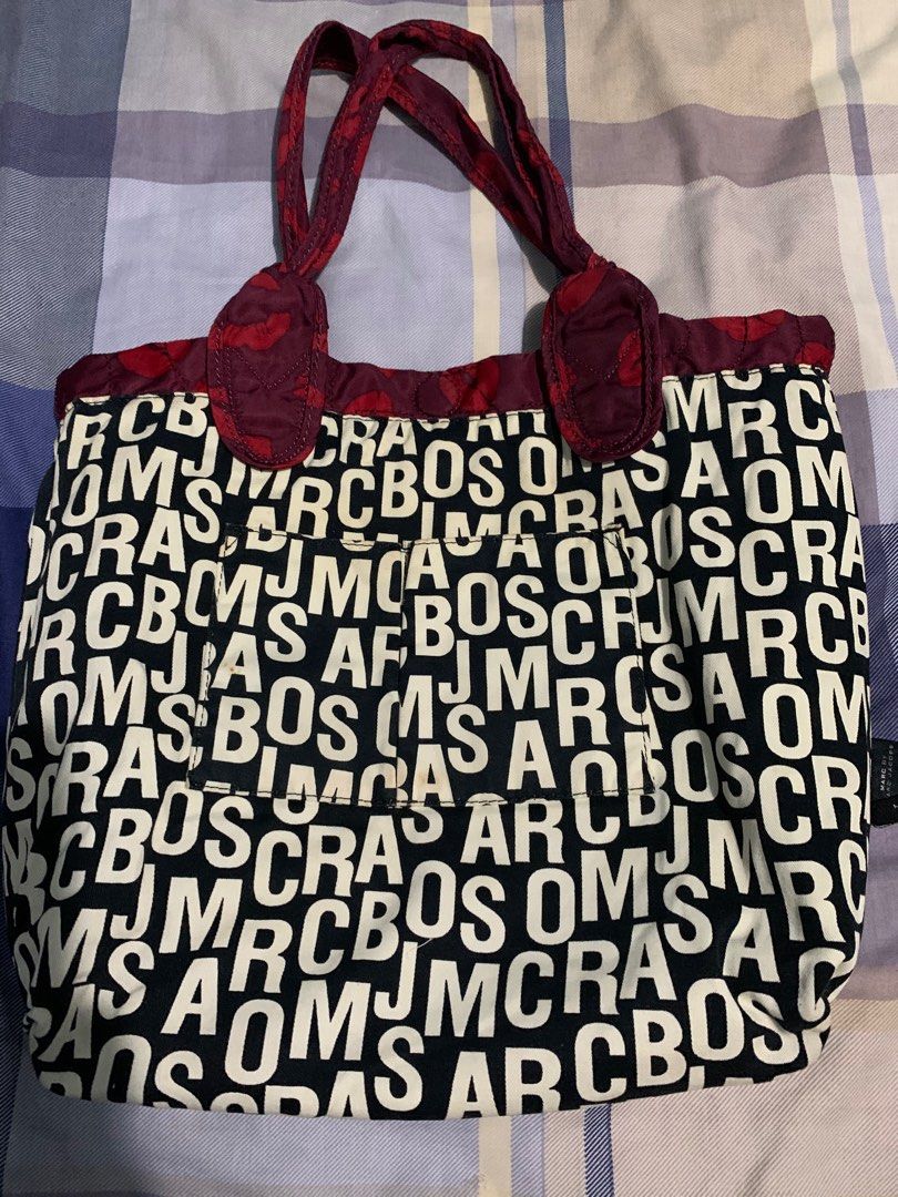 SALE! Marc Jacobs Nylon Bag (Category: Shoulder Bags) located in Quezon City. Submitted by meamelia (Listing ID 1217218362, Image 3). Description: Authentic Marc Jacobs Nylon Tote Size: Medium Reversible Color: red maroon pls refer to photos RFS: decluttering.