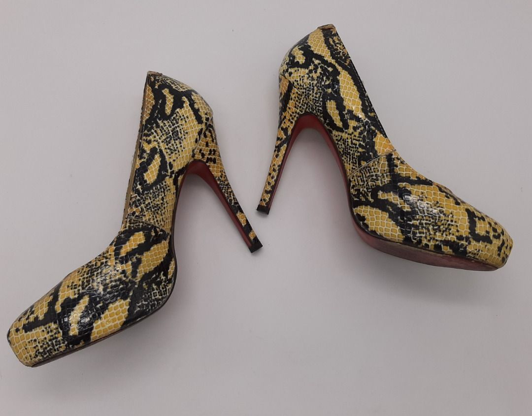 high heels with snakes
