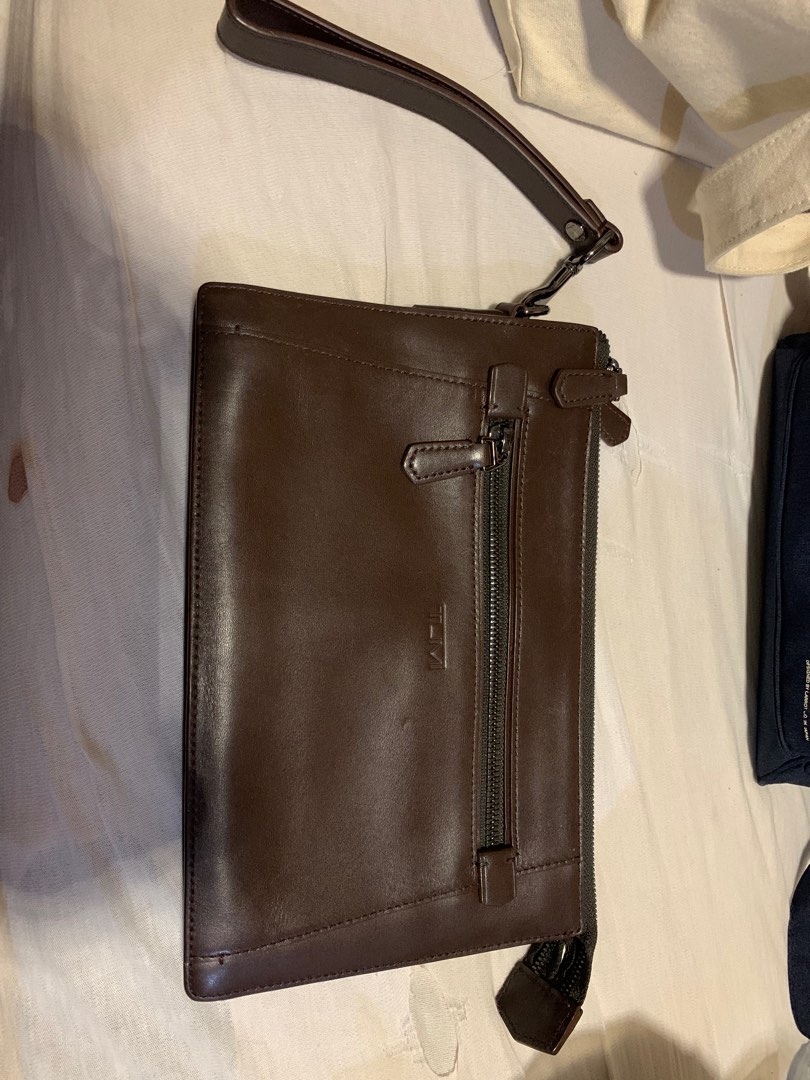 Tumi clutch, Luxury, Bags & Wallets on Carousell