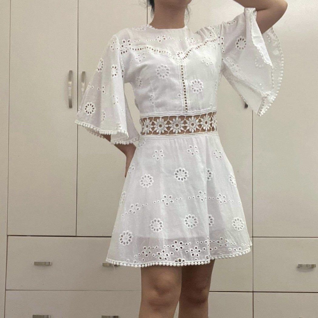 White backless eyelet mini dress (Category: Dresses) located in Quezon City. Submitted by sudo8 (Listing ID 1217040530, Image 1). Description: .