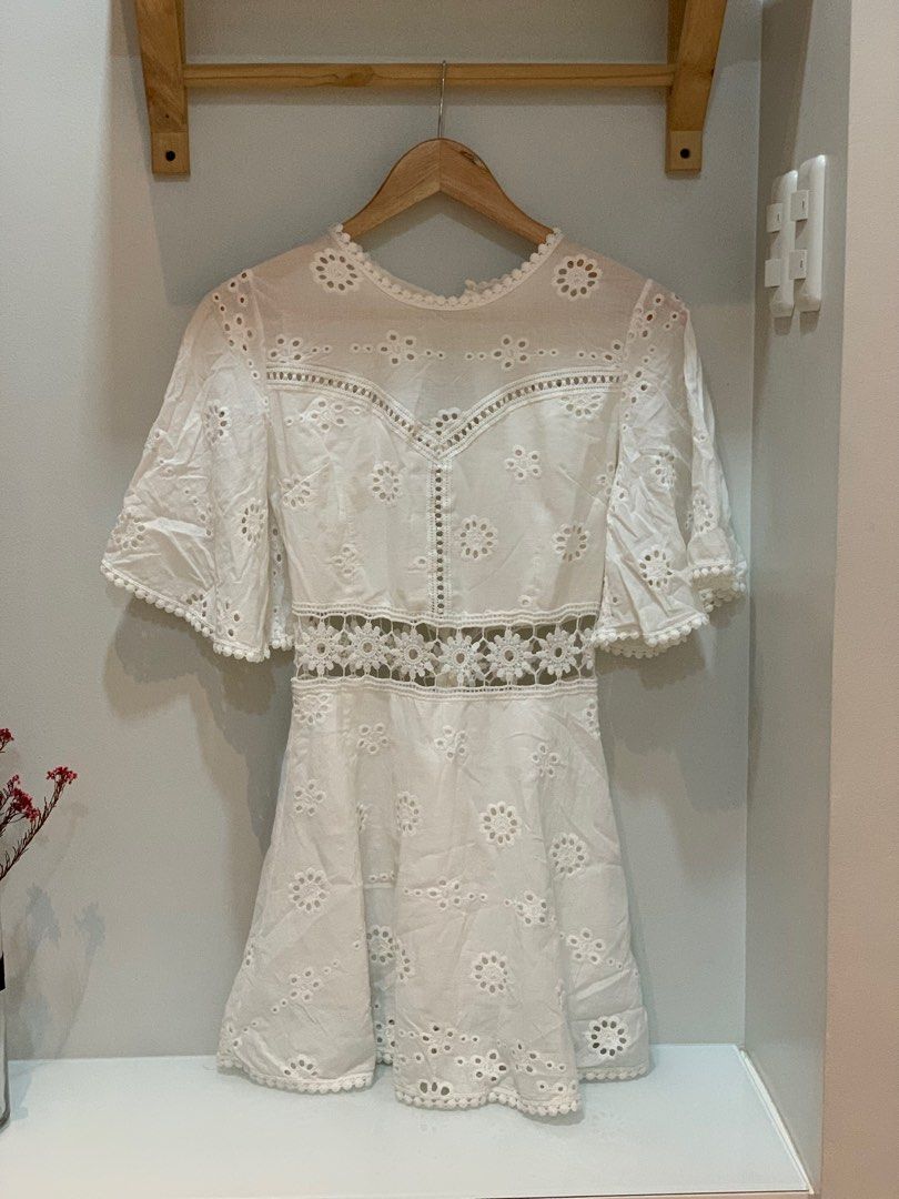 White backless eyelet mini dress (Category: Dresses) located in Quezon City. Submitted by sudo8 (Listing ID 1217040530, Image 3). Description: .