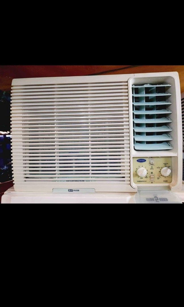 Carrier brand 1HP aircon window type.. used but not abused., TV & Home