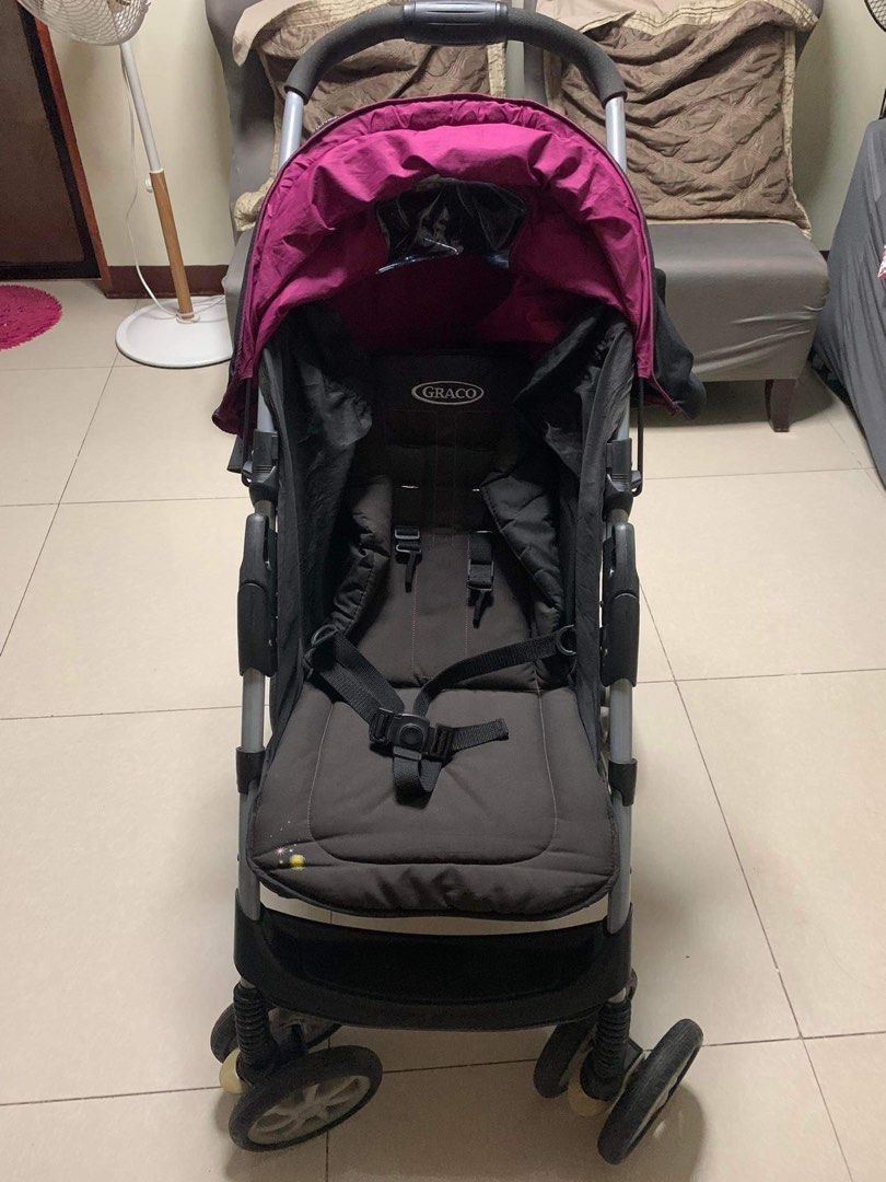 Graco pink and black stroller top