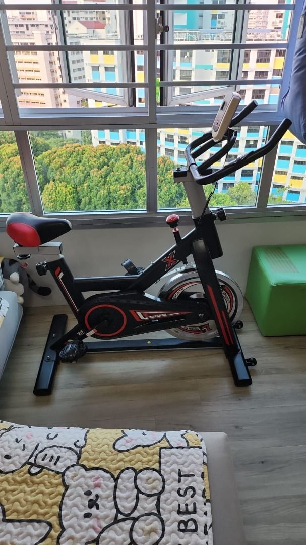 Dynamic top spin bike
