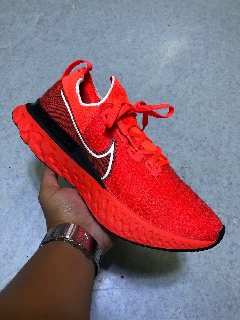 Nike React Infinity Run Flyknit ‘Bright Crimson’(29 cm) (Category: Sneakers) located in Baguio. Submitted by master_of_brands (Listing ID 1217350259, Image 1). Description: Authentic Nike React Infinity Run Flyknit Bright Crimson Black Size 11 US/29 cm/45 Europe Slightly used No issue Thick outsole Bought in 🇺🇸 In excellent condition .