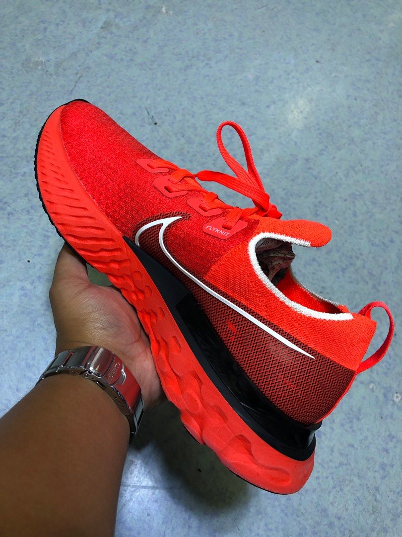 Nike React Infinity Run Flyknit ‘Bright Crimson’(29 cm) (Category: Sneakers) located in Baguio. Submitted by master_of_brands (Listing ID 1217350259, Image 2). Description: Authentic Nike React Infinity Run Flyknit Bright Crimson Black Size 11 US/29 cm/45 Europe Slightly used No issue Thick outsole Bought in 🇺🇸 In excellent condition .