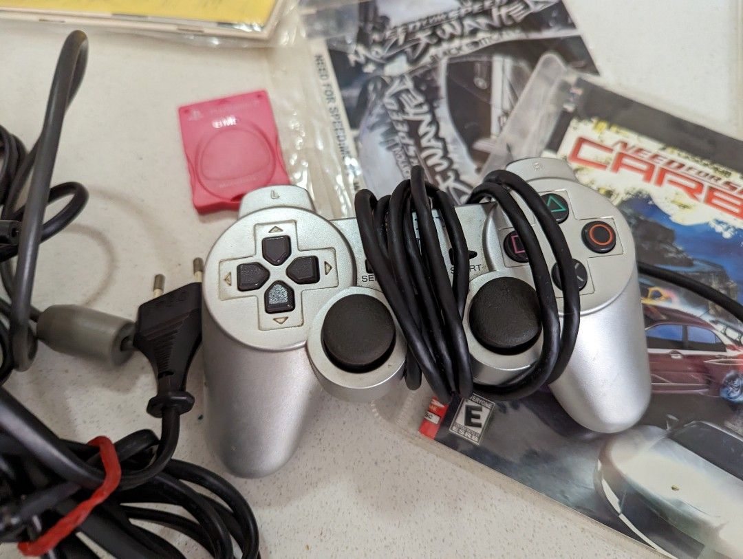 Ps2 slim console modded with 10+ games and few controller. Working ...