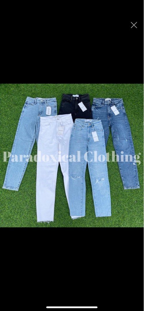 Stradivarius White Slim Fit Mom Jeans (Category: Jeans) located in Taguig. Submitted by jbep_ (Listing ID 1217249725, Image 2). Description: Bought for ₱550 from Paradoxical Clothing on Shopee. Used only once. It doesn’t fit me as nice as I thought it would since I gained weight. Size 28-29 SIZE GUIDE: -based on measuring tape laid flat, in inches. LENGTH - 38 inches approx. Stradivarius Slim Fit Mom Jeans is semi stretchable. Sizing is based on 