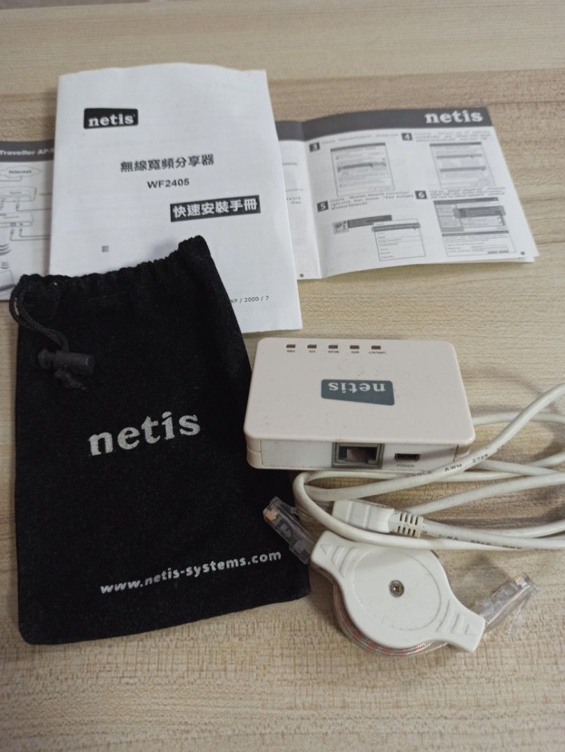 旅行用的無線路由器Wireless-N Traveller AP/ Router （分類：Wifi及上網相關產品）位於 Hong Kong。 由 beebear0402 提交（商品編號 1217249842，圖片 2）。簡介： Netis wireless-N Traveller AP/Router WF2405. Suitable for travelling use. With wire, manual and case. 附說明書、線和套，適合旅行時使用。。