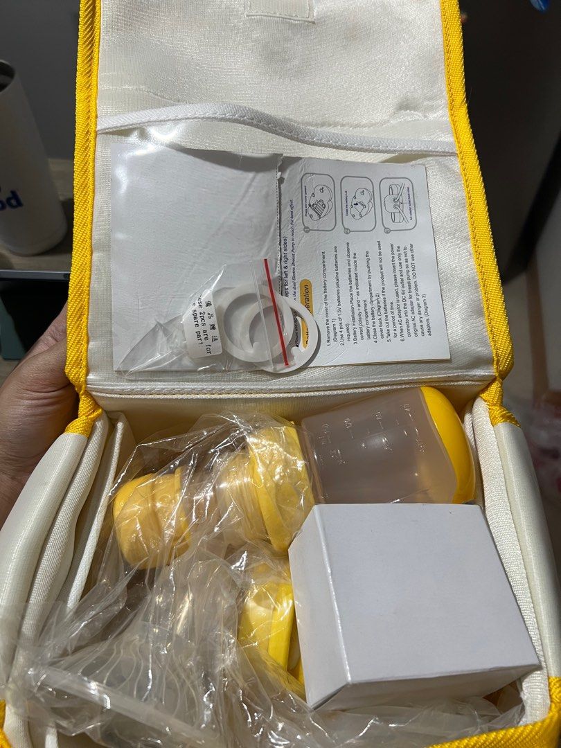 Ai-non breastpump (Category: Breastfeeding & Bottle Feeding) located in Makati City. Submitted by mabz21 (Listing ID 1217464459, Image 3). Description: May 2 other pumps pa kasi ako kaya not used open lang po para makita laman. .