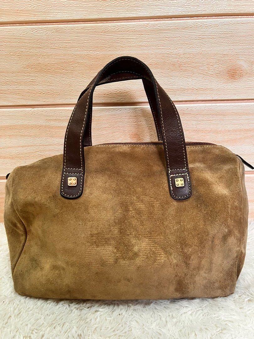 Authentic Loewe Mini Boston handbag (Category: Luxury Bags & Wallets) located in Cagayan de Oro. Submitted by riggstuffs (Listing ID 1217544461, Image 2). Description: Guaranteed authentic Loewe Mini Boston handbag Made in Spain Exterior material is made of suede and have some signs of use Interior is is clean and has no smell Disclaimer Riggstuffs is not associated or affiliated with the brand posted. All trademarks and copyrights belong solely 