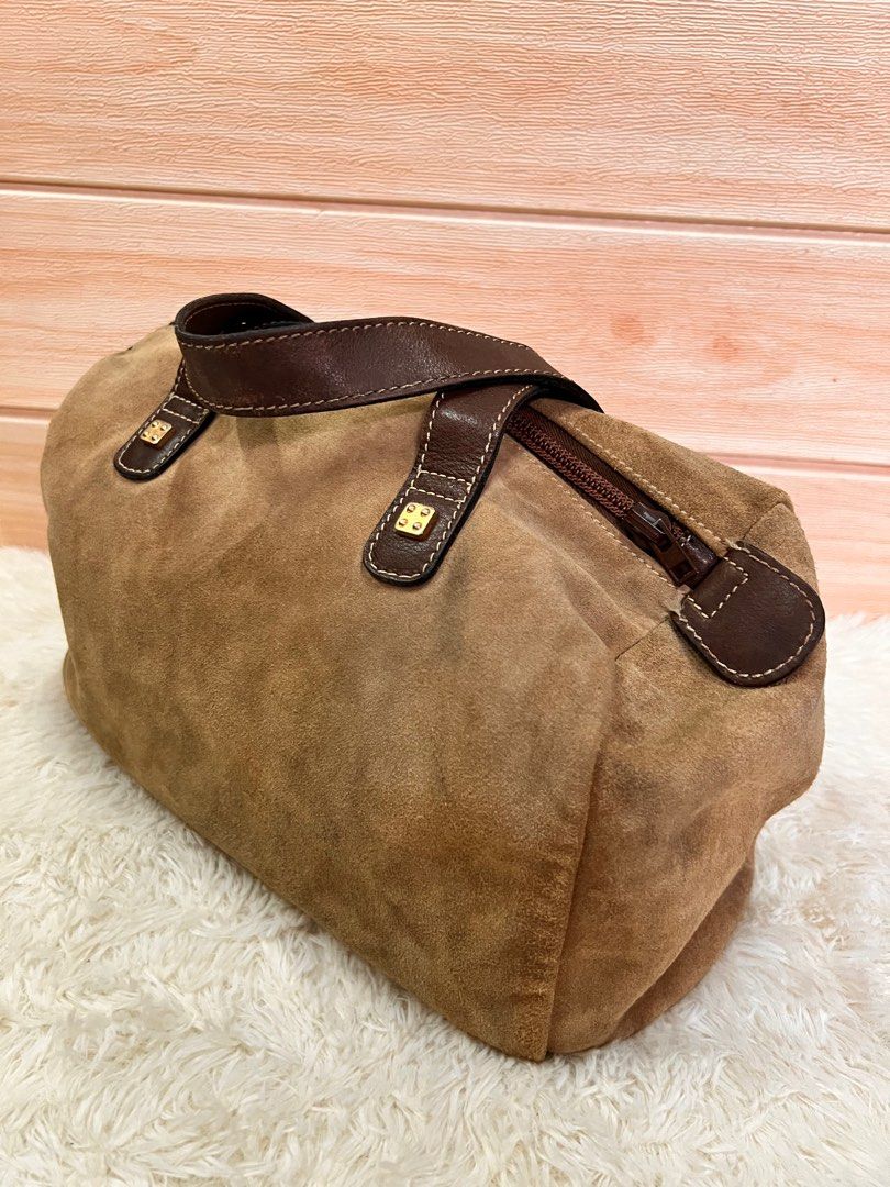 Authentic Loewe Mini Boston handbag (Category: Luxury Bags & Wallets) located in Cagayan de Oro. Submitted by riggstuffs (Listing ID 1217544461, Image 3). Description: Guaranteed authentic Loewe Mini Boston handbag Made in Spain Exterior material is made of suede and have some signs of use Interior is is clean and has no smell Disclaimer Riggstuffs is not associated or affiliated with the brand posted. All trademarks and copyrights belong solely 