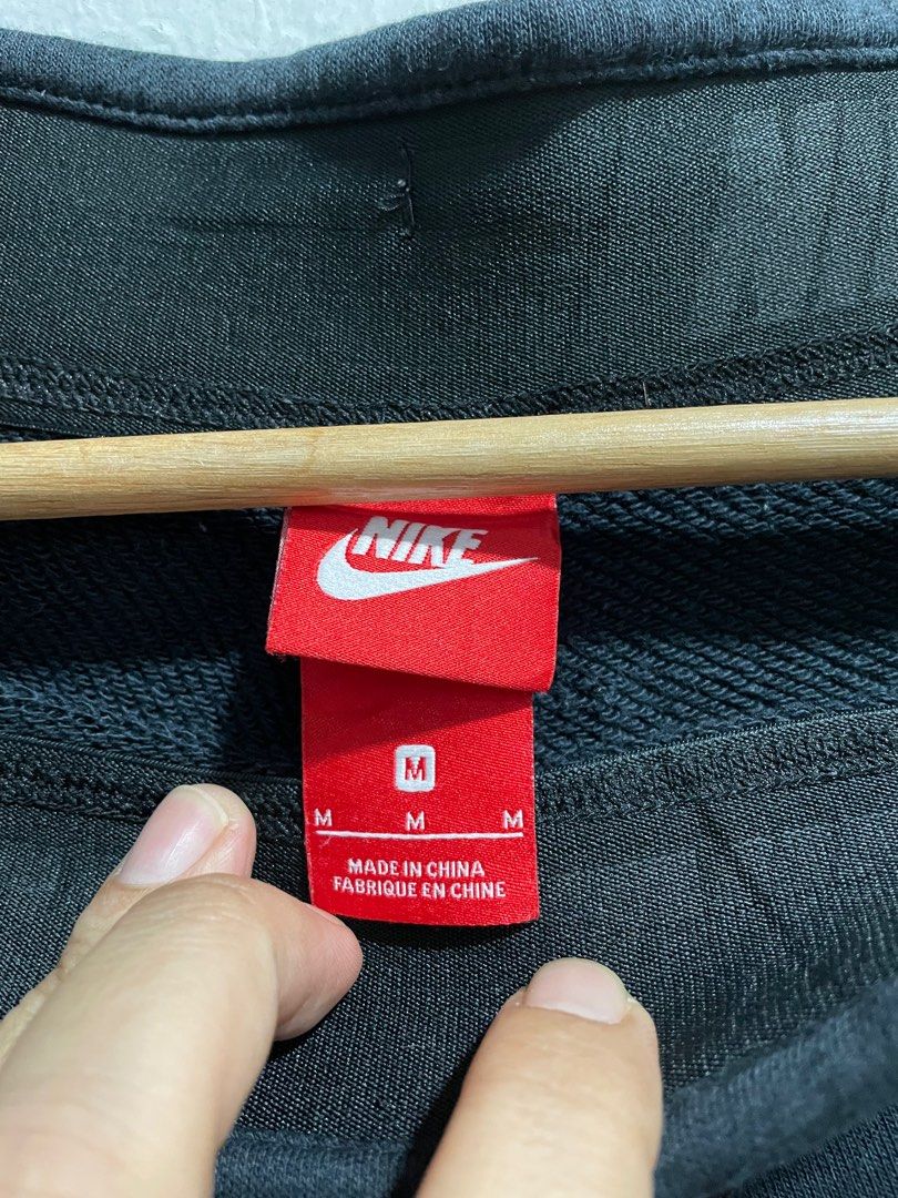 nike jogger pants red tag