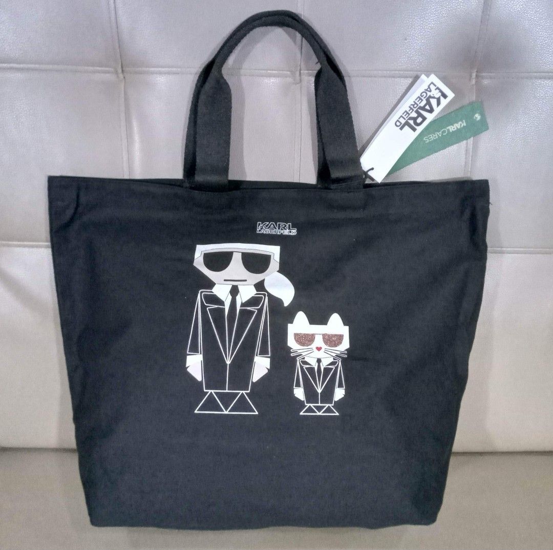Karl Lagerfeld Large Canvas Tote (Category: Luxury Bags & Wallets) located in Taguig. Submitted by esa.agustin (Listing ID 1217452179, Image 1). Description: Original Karl Lagerfeld large black canvas tote bag. With tag..