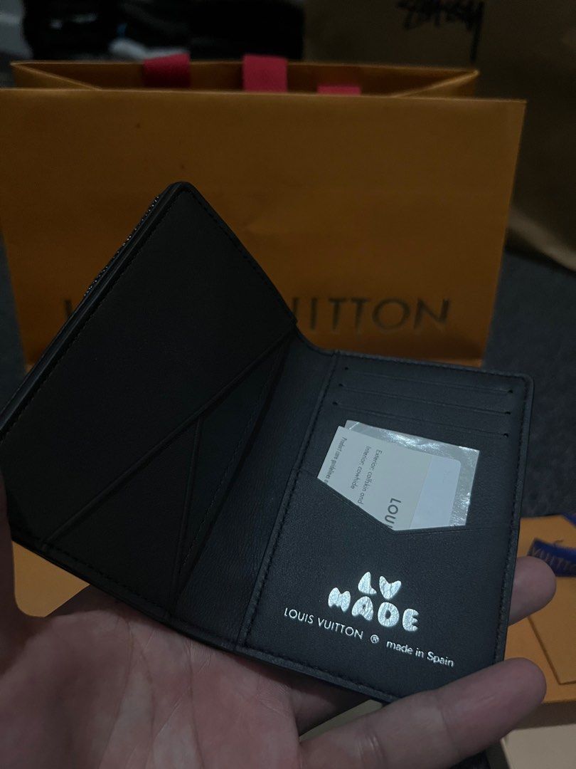 Louis Vuitton x Human Made Pocket Organizer (Category: Luxury Bags & Wallets) located in Makati City. Submitted by miko_villena (Listing ID 1217452966, Image 2). Description: This a collaboration between Louis Vuitton and Human Made. Purchased from LV Greenbelt..