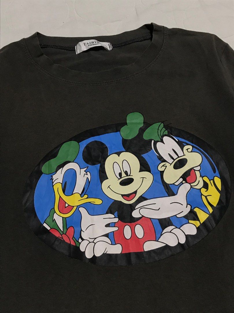 Mickey Mouse Tshirt (Category: Shirts) located in Binan City. Submitted by lagunaxpreloved (Listing ID 1217608221, Image 2). Description: PRELOVED NEED WASH 9/10 Condition Size L-XL DIMENSION LENGTH 24 WIDTH 19 150 ADD SF.