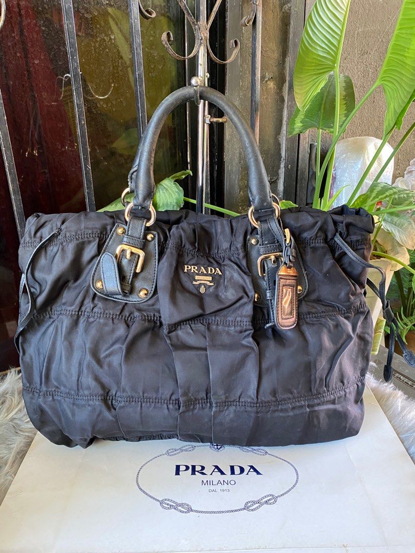 ORIG PRADA TESSUTO BAG😍 (Category: Luxury Bags & Wallets) located in Bacolod City. Submitted by chuchaystuffs (Listing ID 1217452128, Image 1). Description: Signs of use sa handle Meron gas gas Tpos wla na po sling at code nya see pics to appreciate .