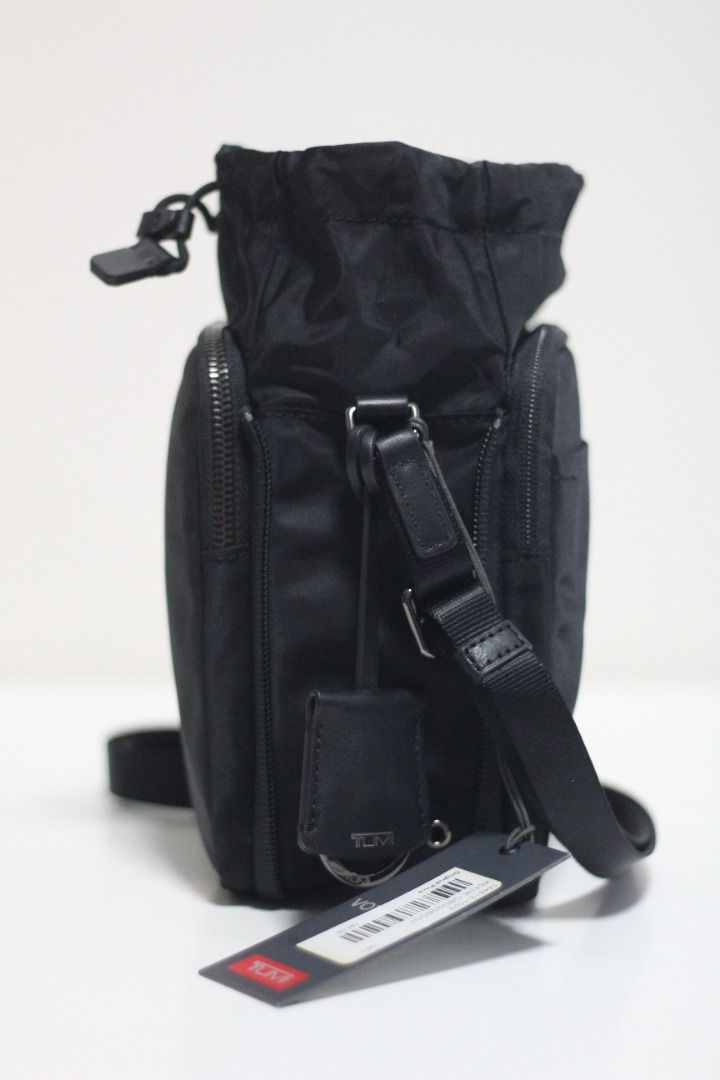 Retail $350 - New 0196486DG - BLACK/GUNMETAL Voyageur Keene Crossbody /  sling bag / water bottle carrier /, Women's Fashion, Bags u0026 Wallets, Purses  u0026 Pouches on Carousell