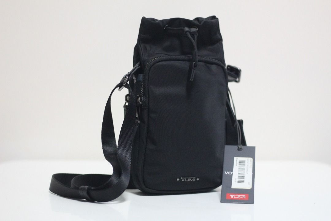 Retail $350 - New 0196486DG - BLACK/GUNMETAL Voyageur Keene Crossbody /  sling bag / water bottle carrier /, Women's Fashion, Bags u0026 Wallets, Purses  u0026 Pouches on Carousell