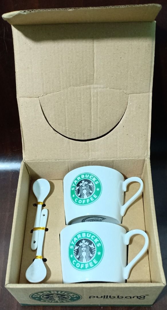Authentic Starbucks Coffee Ceramics 2 cups with 2 spoons set (Category: Coffee & Tea Tableware) located in Carmona. Submitted by xena2.0 (Listing ID 1217552196, Image 1). Description: Authentic Starbucks Coffee Ceramics cup/With spoons/one set ➡️ Eco-friendly ➡️Kit Type: Two-piece Set ➡️Material: Ceramic ➡️Technique: Engraving ➡️Color: White ➡️Ceramic Type: Clay ➡️Item Weight: 0.50Kg ➡️Product Dimensions: 16 x 17 x 9 cm The Perfect Gift Set For A