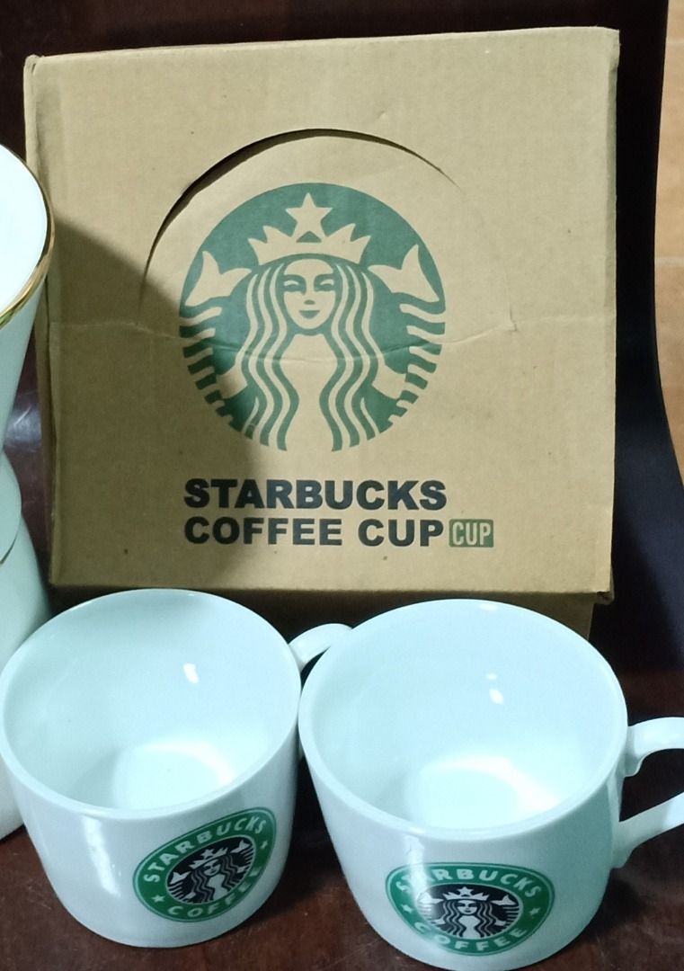 Authentic Starbucks Coffee Ceramics 2 cups with 2 spoons set (Category: Coffee & Tea Tableware) located in Carmona. Submitted by xena2.0 (Listing ID 1217552196, Image 2). Description: Authentic Starbucks Coffee Ceramics cup/With spoons/one set ➡️ Eco-friendly ➡️Kit Type: Two-piece Set ➡️Material: Ceramic ➡️Technique: Engraving ➡️Color: White ➡️Ceramic Type: Clay ➡️Item Weight: 0.50Kg ➡️Product Dimensions: 16 x 17 x 9 cm The Perfect Gift Set For A