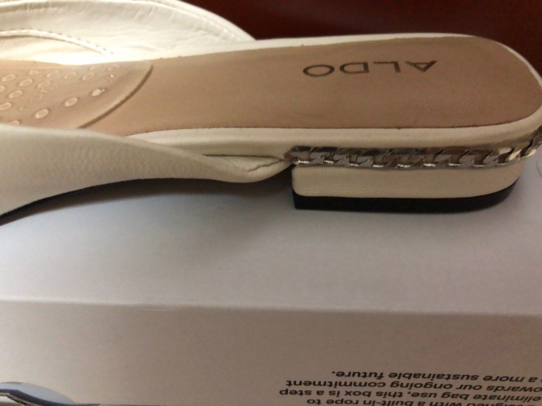 Aldo slip on mules in cream color