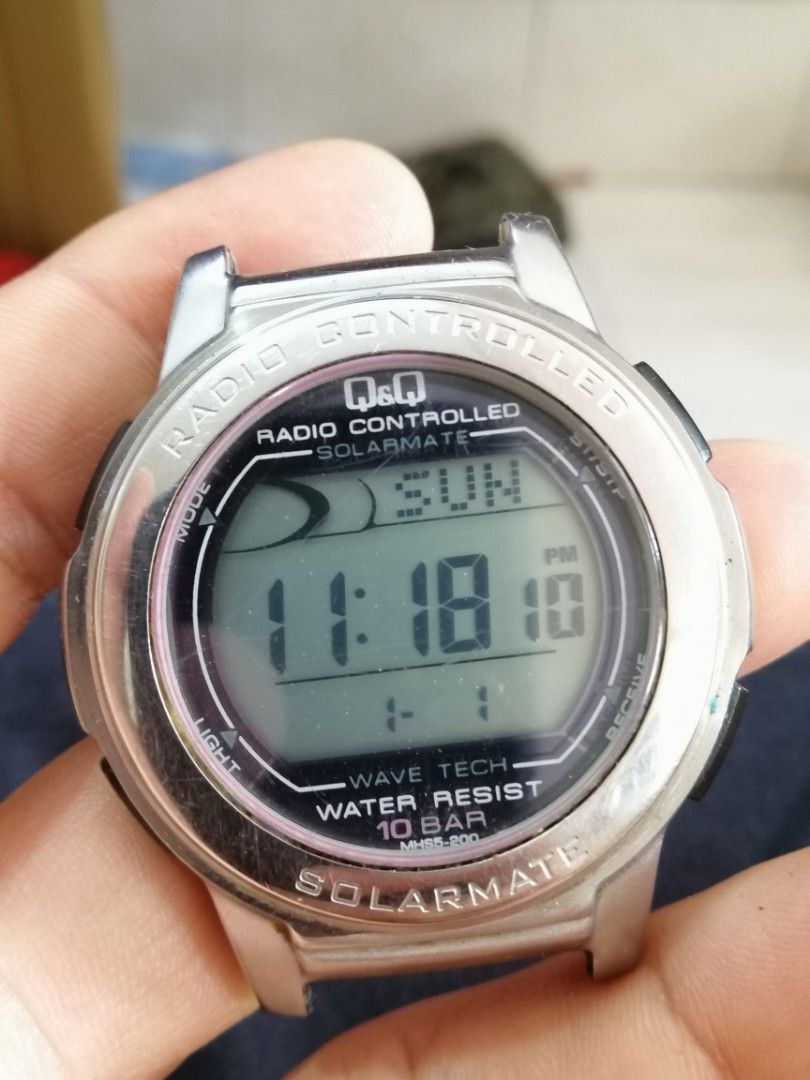 Q&q radio best sale controlled watch