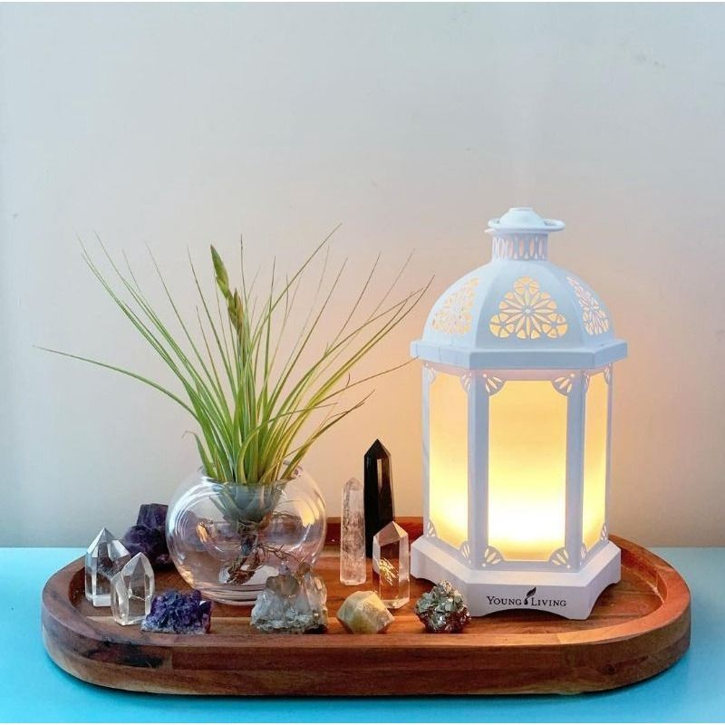 LANTERN DIFFUSER YL with TWO 5mL Essential Oils (Category: Air Purifiers & Dehumidifiers) located in Dumaguete. Submitted by mcqueen_storehouse (Listing ID 1217620494, Image 1). Description: Complement your décor and set the mood with the Lantern Diffuser. A warm and welcoming invitation for guests, this stunning lantern made with exquisite metal and glass details transforms any room. With longer run times and 11 light features, including an allu