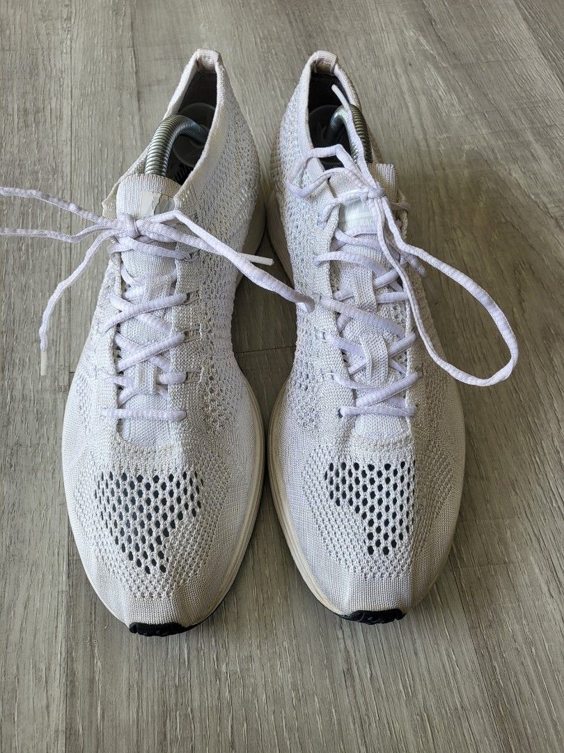 navy and pink nike trainers