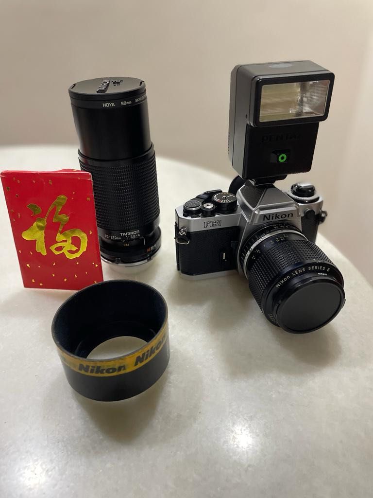 Nikon FE2 camera with 2 lens and Flash, Photography, Cameras on Carousell