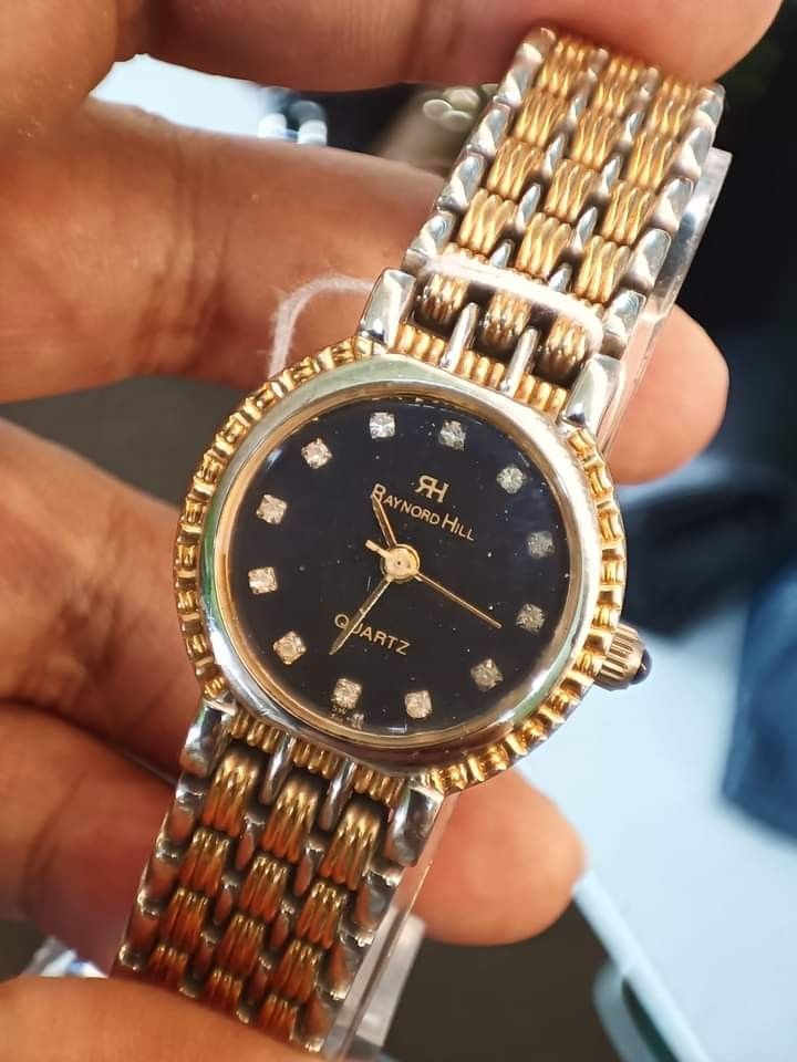 Raymond hill watches sales