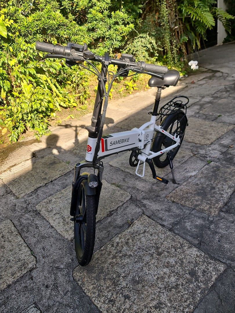 SAMEBIKE Foldable E-Bike (Category: Bicycles) located in Makati City. Submitted by harvesting_game (Listing ID 1217693764, Image 3). Description: Electric foldable bike by Samebike. Lightly used by owner. Total of 166 km usage. Used only in our village during the pandemic. 35kmh, 350w hub motor, 7 speed, 20 in tires, removable 48v 10ah battery. Comes with a working headlight,rechargeable led brakelight, multi-speed gearing, electric horn, battery