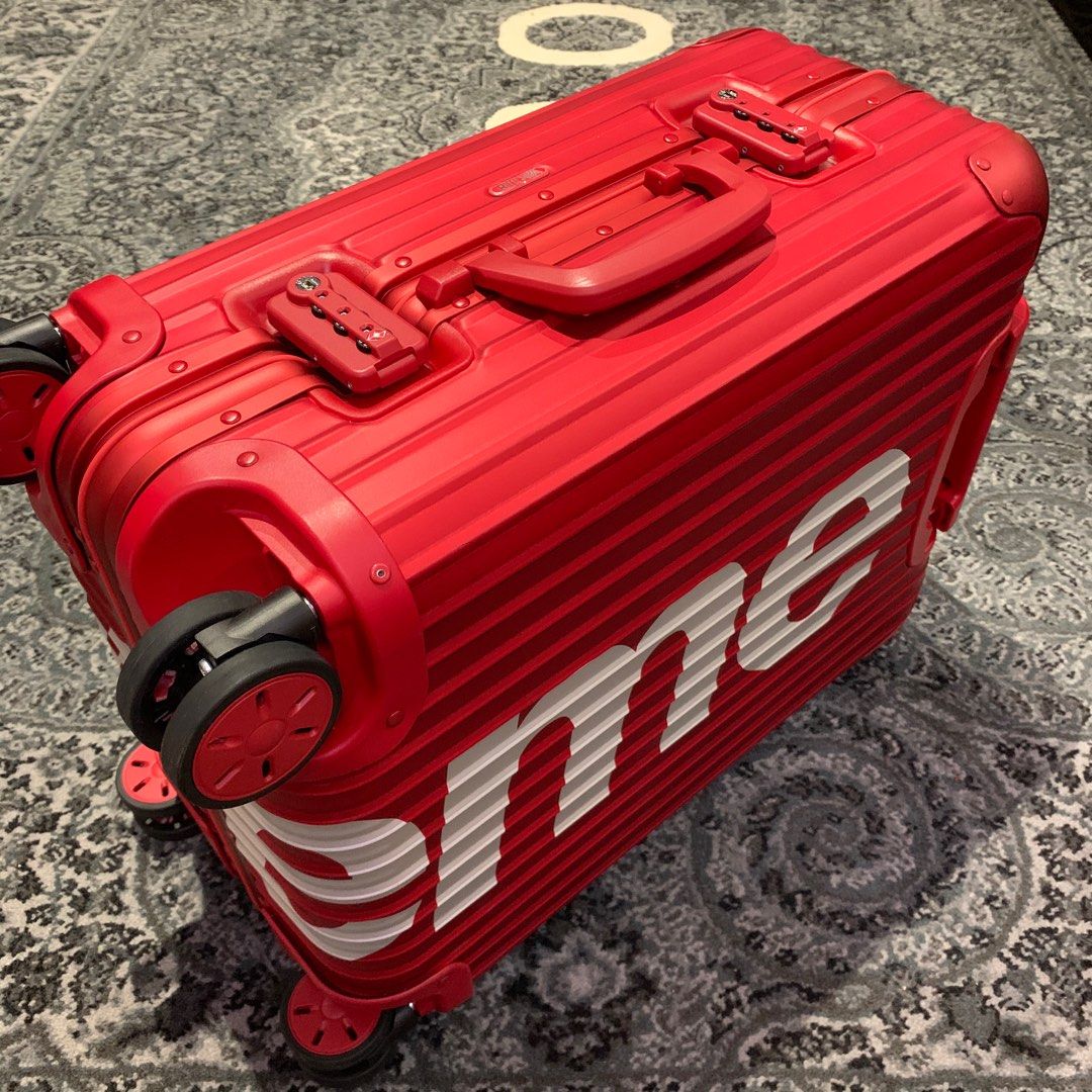 Supreme x Rimowa Topas Multiwheel 45L red and black