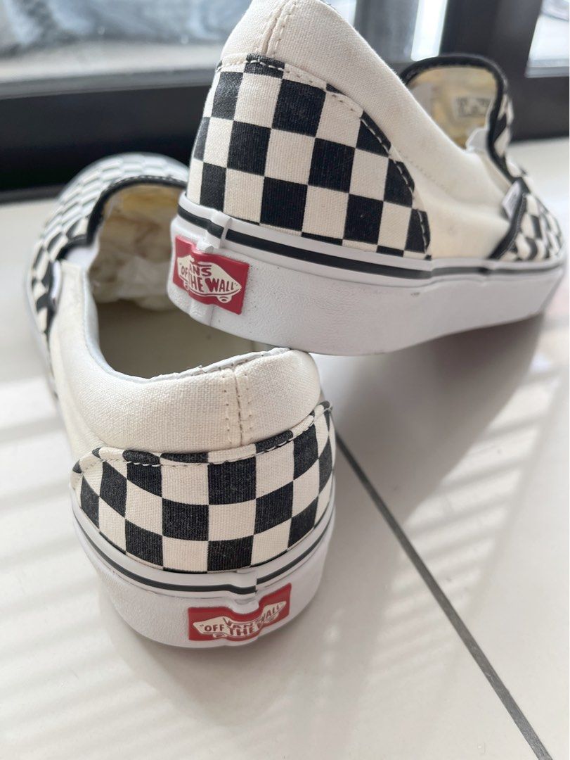 Black and white store plaid slip on vans