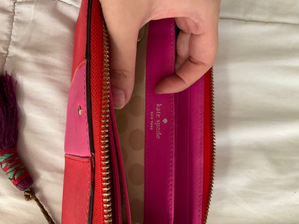 Authentic Kate Spade Wallet (Category: Luxury Bags & Wallets) located in Manila. Submitted by ibdecluttering (Listing ID 1217892675, Image 3). Description: Well loved Signs of wear and tear but overall good condition 100% authentic bought from HK Price negotiable .