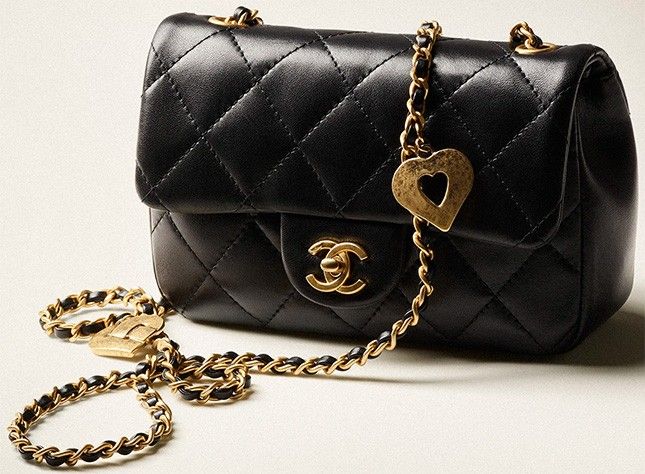 Chanel mini flap bag with heart cc charm, Luxury, Bags & Wallets