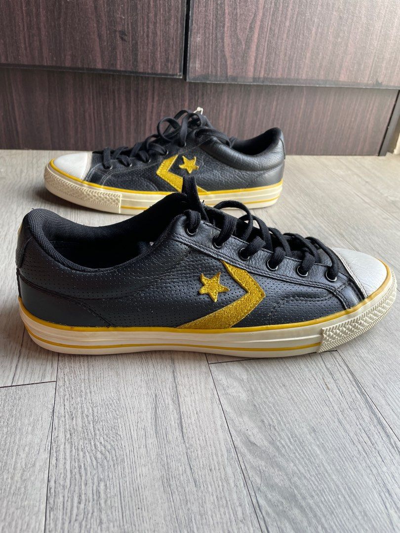 Black and store yellow converse shoes