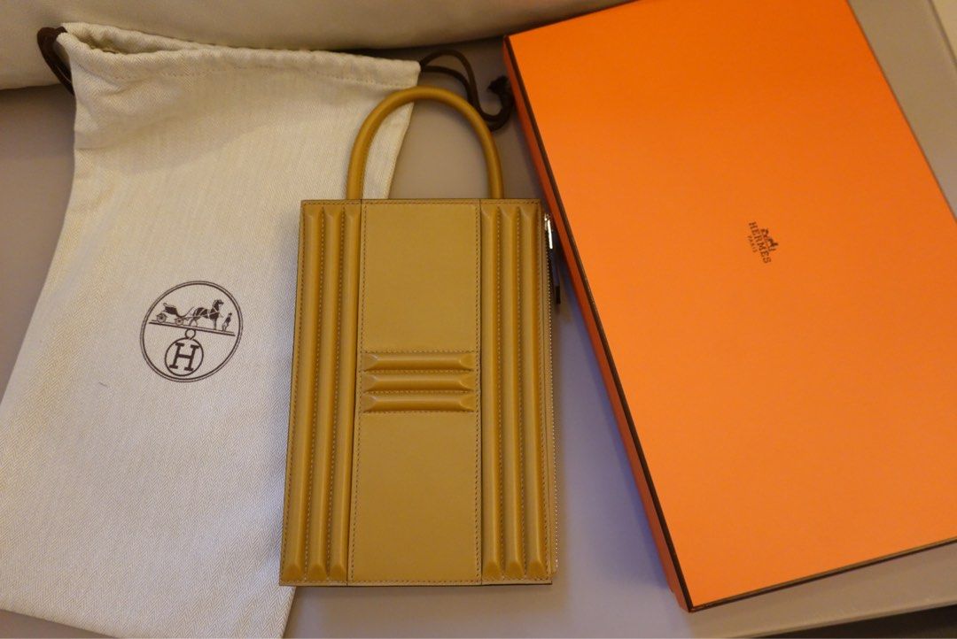 Hermes Pochette Cadenas (Autumn/ Winter runway) (Category: Luxury Bags & Wallets) located in Quezon City. Submitted by lxpmnl (Listing ID 1217816049, Image 2). Description: Pochette Cadenas (Autumn/Winter 2022 runway) condition: brand new inclusions: complete packaging since purchase (box, dust bag, care booklet, original invoice if needed) where and when bought: Milan, Dec 2022 selling price: Php 600k.