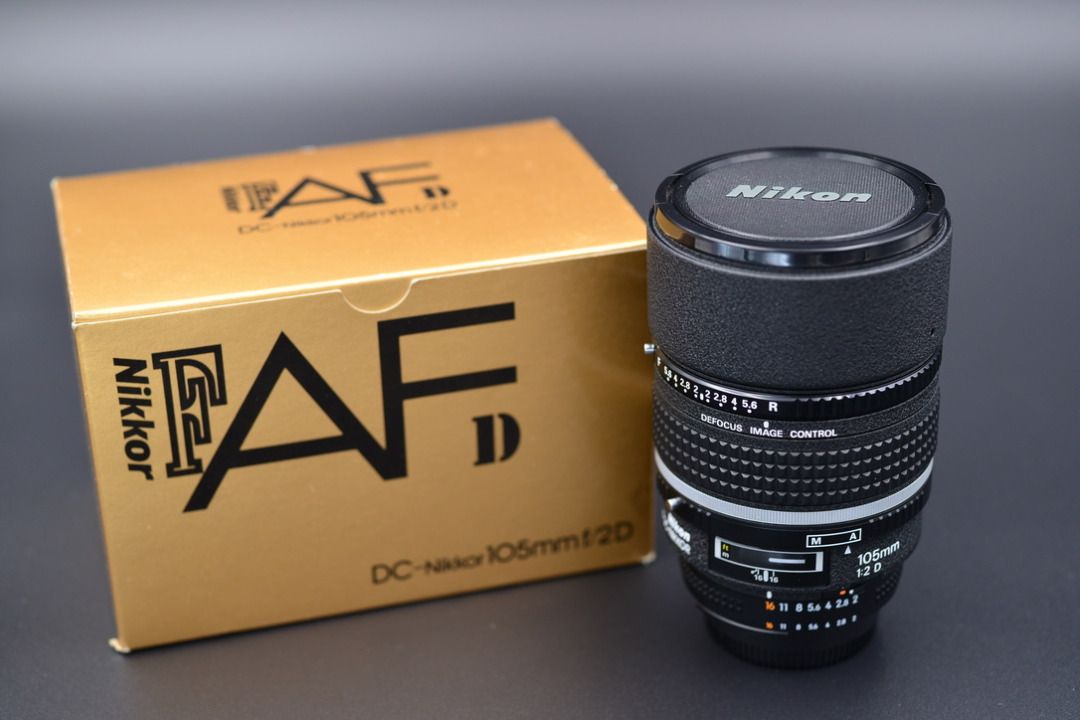 オンラインストア販売店 Nikon AF DC 105mm F2D未使用品レンズ dvap