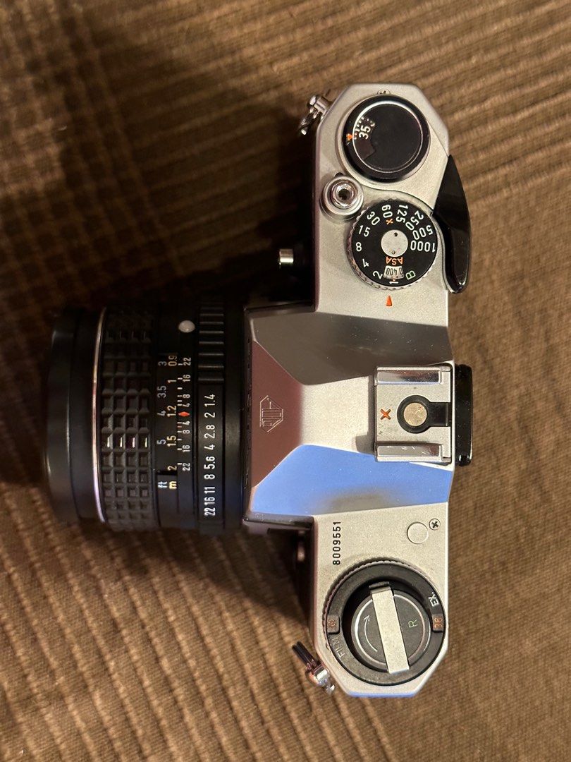 Pentax KM film SLR + 50mm f1.7 lens. Mint condition with new mirror