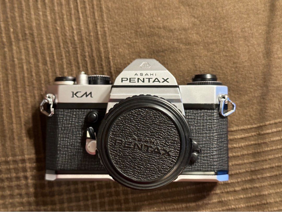Pentax KM film SLR + 50mm f1.7 lens. Mint condition with new mirror