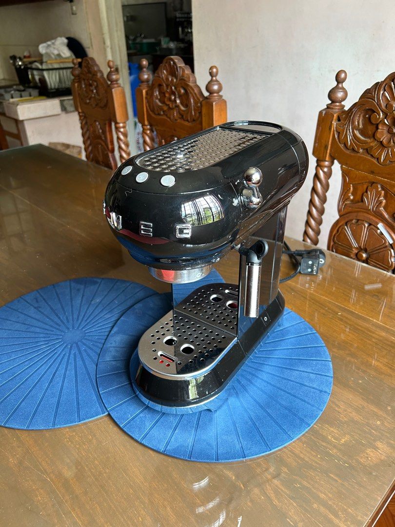 Smeg Espresso Machine (Category: Coffee Machines & Makers) located in Las Pinas. Submitted by damitatbp (Listing ID 1215341288, Image 3). Description: Set bought in 2021. Works well with minimal flaws. Espresso Machine includes: 1. Portafilter 2. 3 pressurized baskets Additional 2k for the following items: 1. Bottomless portafilter 2. Palm Tamper with distributor 3. Dosing Cup 4. Dosing ring RFS: Espresso Machine upgrade Can do meetups around Las