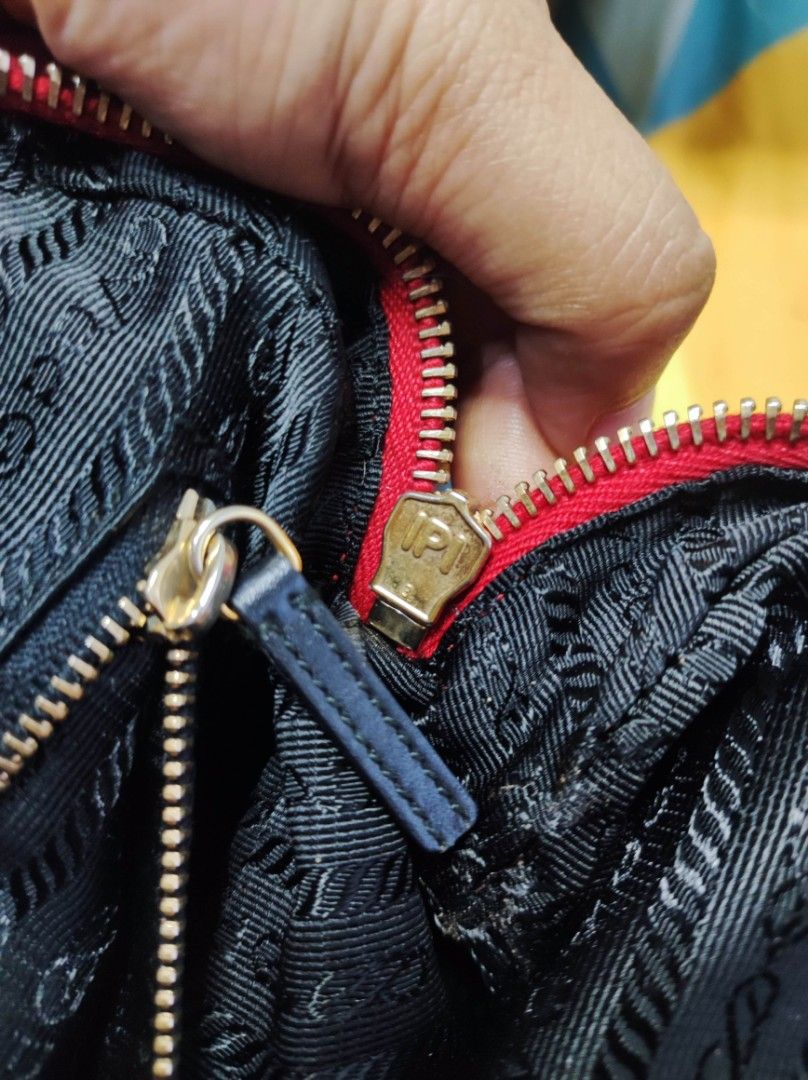 Prada zipper 2025 authentic